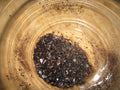 Actual ground dried Persian black limes, accurately representing Spice Czar Ground Black Lime. Photo by Roban Kramer via Wikimedia Commons, CC BY-SA 2.0.