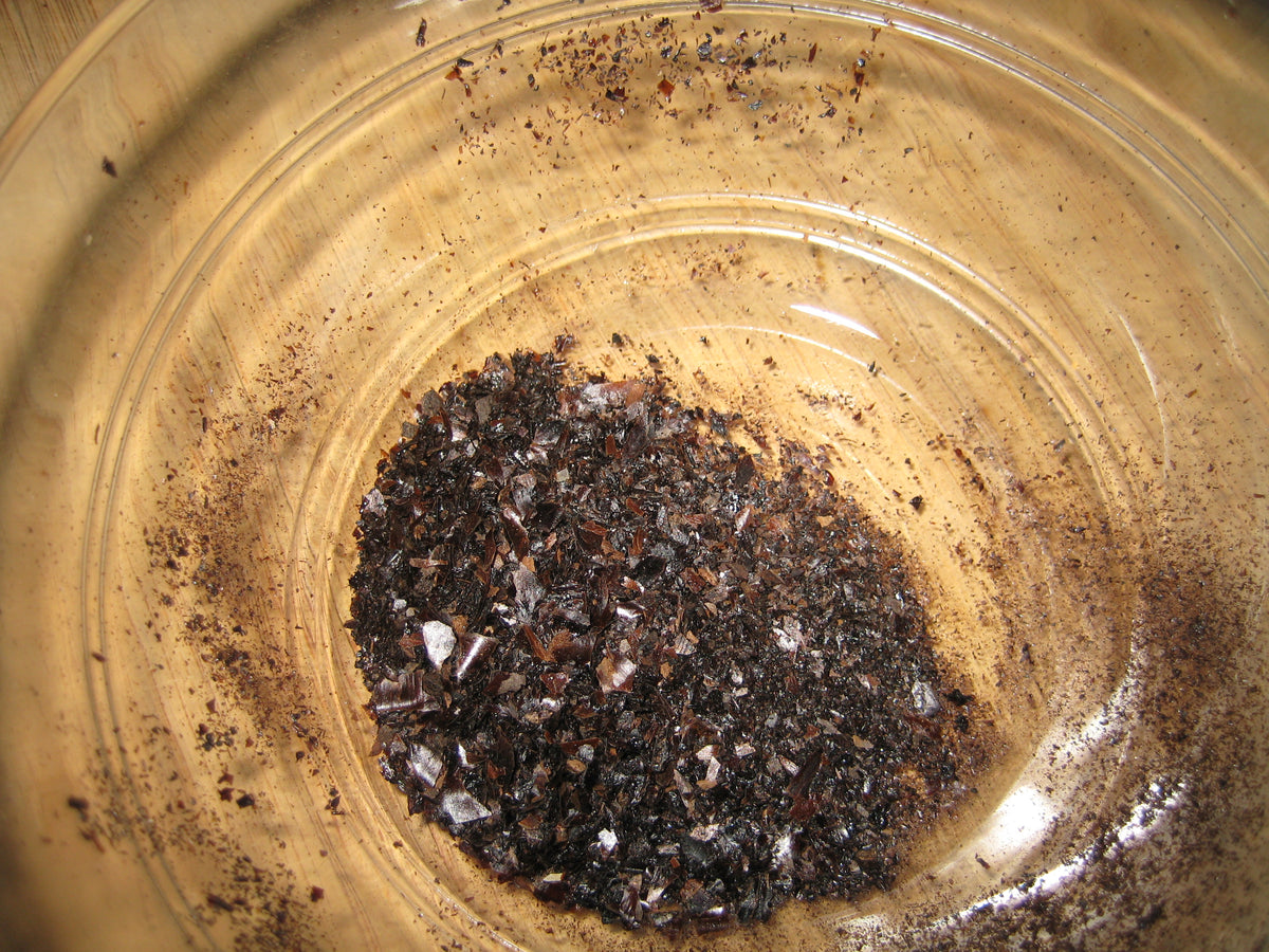 Actual ground dried Persian black limes, accurately representing Spice Czar Ground Black Lime. Photo by Roban Kramer via Wikimedia Commons, CC BY-SA 2.0.
