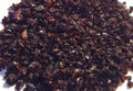 Flaked Turkish Urfa biber, also called Isot chile, accurately representing Spice Czar Urfa Biber Chile Flakes. Photo by Fornax via Wikimedia Commons, CC BY-SA 3.0.