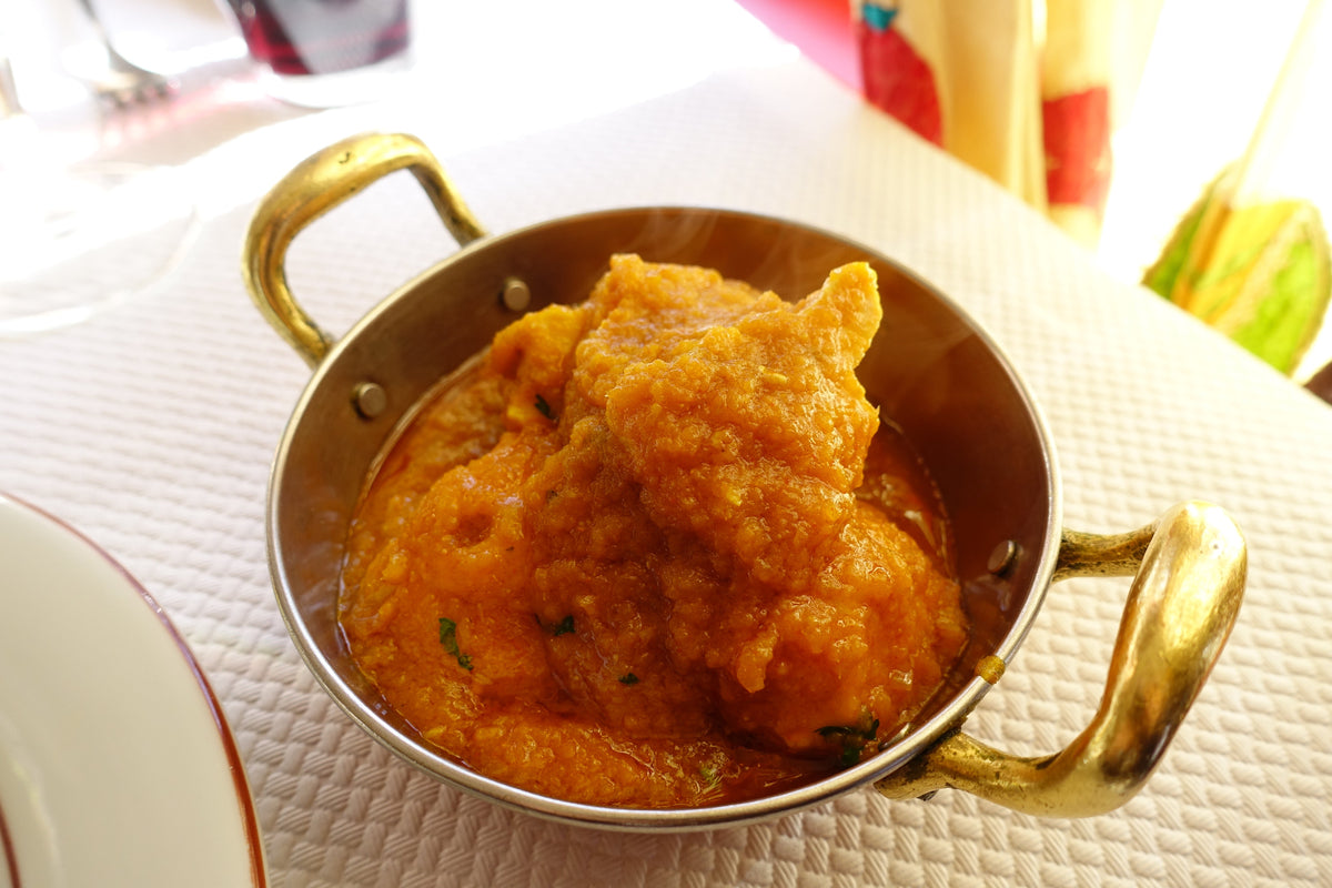 Madras chicken curry. Photo by Guilhem Vellut via Wikimedia Commons, CC BY 2.0.
