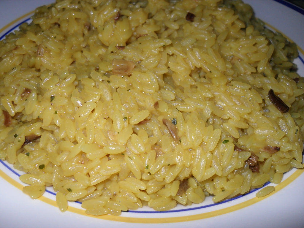 High-resolution porcini mushroom risotto made with Boletus edulis, a signature use for Spice Czar Porcini Mushroom Powder. Photo by Number55 via Wikimedia Commons.