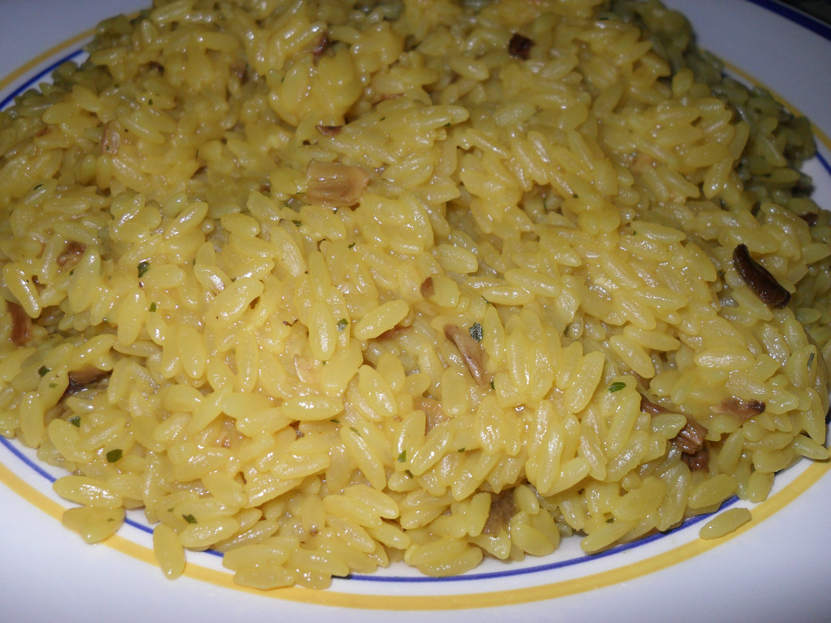 High-resolution porcini mushroom risotto made with Boletus edulis, a signature use for Spice Czar Porcini Mushroom Powder. Photo by Number55 via Wikimedia Commons.