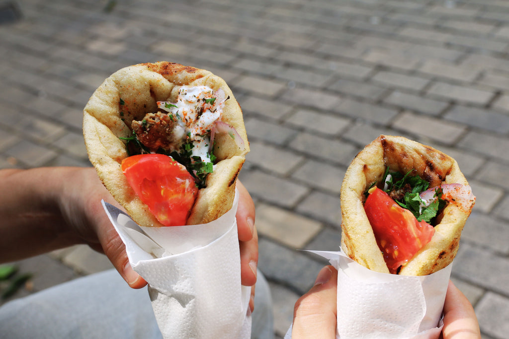Greek gyro wraps with tomato, herbs and tzatziki