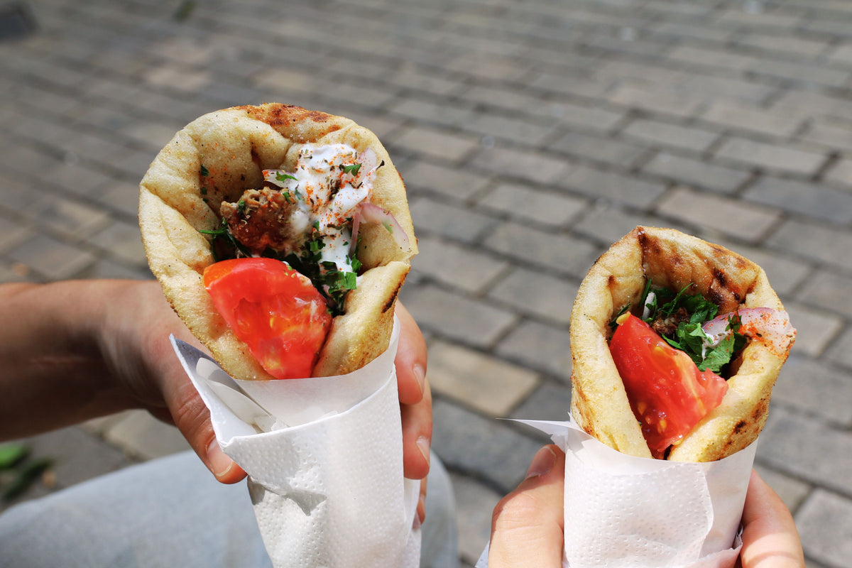 Greek gyro wraps with tomato, herbs and tzatziki