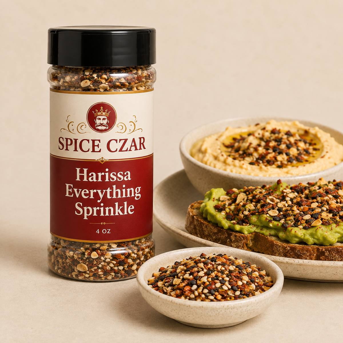 Harissa Everything Sprinkle in labeled 4 oz shaker with loose seed blend, hummus, and avocado toast