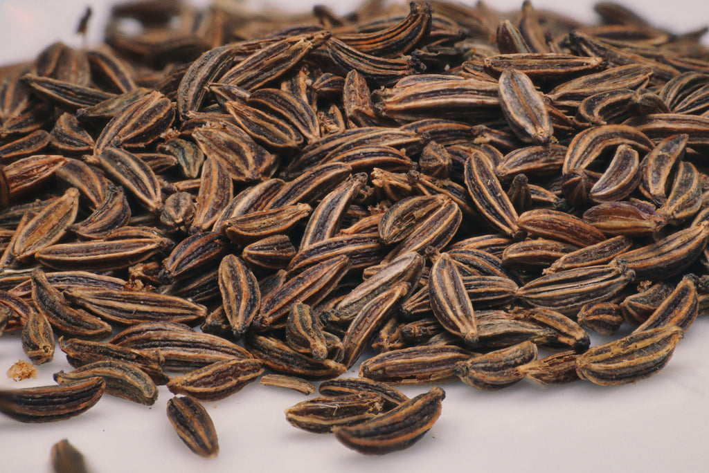 High-resolution close-up of whole caraway seeds, accurately representing Spice Czar Caraway Seeds. Photo by Patrick via Pexels, free to use.