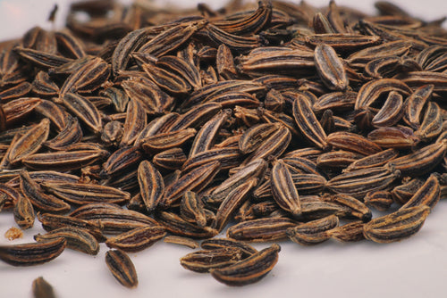 High-resolution close-up of whole caraway seeds, accurately representing Spice Czar Caraway Seeds. Photo by Patrick via Pexels, free to use.