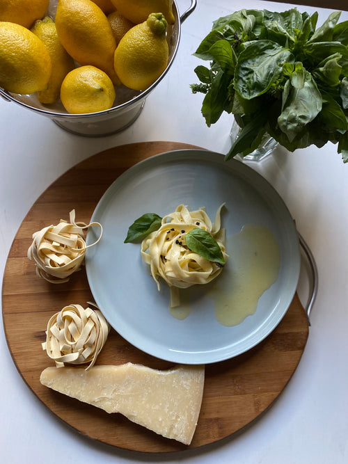 Fresh pasta with Parmesan, lemons and basil representing the cheesy, lemony Mediterranean profile of Spice Czar Amalfi Seasoning. Photo by Ranya Obeidallah via Pexels, free to use under the Pexels license.