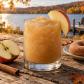 Serving suggestion: Apple Cider Donut slushy with complementary fruit and autumn lake scenery.