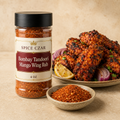 Spice Czar Bombay Tandoori Mango Wing Rub 4 oz shaker with orange-red spice and tandoori chicken wings
