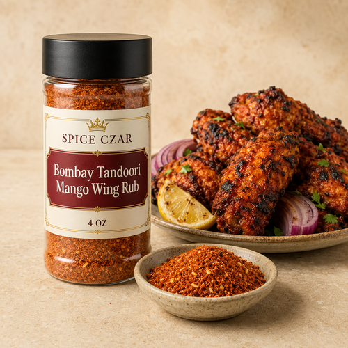 Spice Czar Bombay Tandoori Mango Wing Rub 4 oz shaker with orange-red spice and tandoori chicken wings