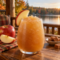 Serving suggestion: Caramel Apple Cider slushy with complementary fruit and autumn lake scenery.