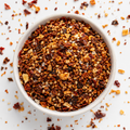 Chili Crisp Seasoning with sesame, garlic and chile flakes in a bowl