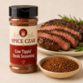 Cow Tippin’ Steak Seasoning 4 oz Spice Czar shaker with visible seasoning and serving suggestion