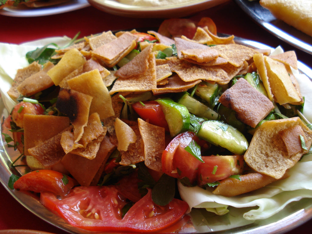 Fattoush salad, a classic Levantine use for tangy ground sumac. Public-domain photo via Wikimedia Commons.