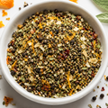Habanero Garlic Pepper in a bowl with black pepper, garlic, orange peel, chile and herbs