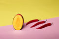 Mango and red chiles representing the fruity sweet-heat profile of Spice Czar Habanero Mango Chicken Rub. Photo by Deon Black via Pexels, free to use under the Pexels license.