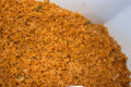 Serving suggestion for Jollof Rice Seasoning: a close-up of cooked tomato-colored jollof rice. Photo by DromoTetteh, CC BY-SA 4.0, via Wikimedia Commons; not a photograph of the dry blend.