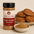 Maple Sausage Seasoning 4 oz Spice Czar shaker beside a plate of browned sausage patties and a dish of the blend