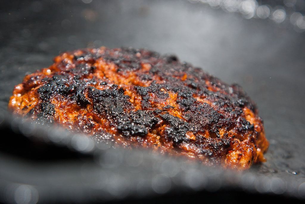 Mexican chorizo cooking on a griddle, a use example for Spice Czar Mexican Chorizo Seasoning. Photo by Ryan Snyder via Wikimedia Commons, CC BY 2.0.