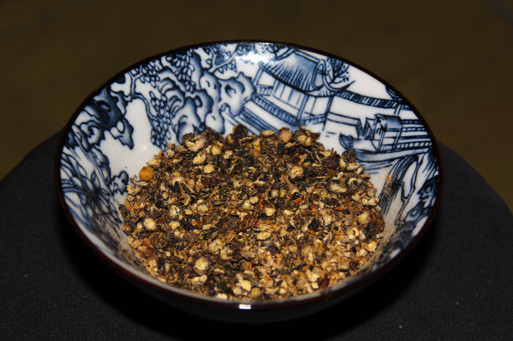 Coarse lemon-pepper seasoning showing the black-pepper and citrus texture that represents Spice Czar Napa Valley Pepper Seasoning. Photo by Krzysztof Blachnicki via Wikimedia Commons, CC BY 4.0.