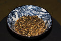 Coarse lemon-pepper seasoning showing the black-pepper and citrus texture that represents Spice Czar Napa Valley Pepper Seasoning. Photo by Krzysztof Blachnicki via Wikimedia Commons, CC BY 4.0.