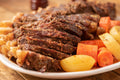 Serving suggestion for Pot Roast Seasoning: tender braised beef with carrots and potatoes. Photo by Thiago Rebouças/Pexels; not a photograph of the dry blend.