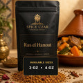 Spice Czar Ras el Hanout with warm golden-brown Moroccan-style spice blend beside tagine-style food