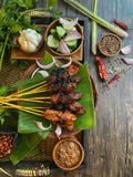 Malaysian chicken satay with peanut sauce shown as a serving use for Spice Czar Satay Seasoning. Photo by Elly Suhailee via Wikimedia Commons, CC BY-SA 4.0.