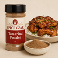 Tamarind Powder 4 oz shaker with visible tamarind powder and glazed chicken serving suggestion