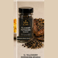 Spice Czar Tellicherry Peppercorn Reserve premium whole black peppercorns beside grilled steak