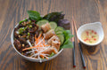 Vietnamese grilled pork with rice noodles and fish sauce shown as a serving use for Spice Czar Vietnamese Pork Rub. Photo by HungryHuy via Wikimedia Commons, CC BY 2.0.