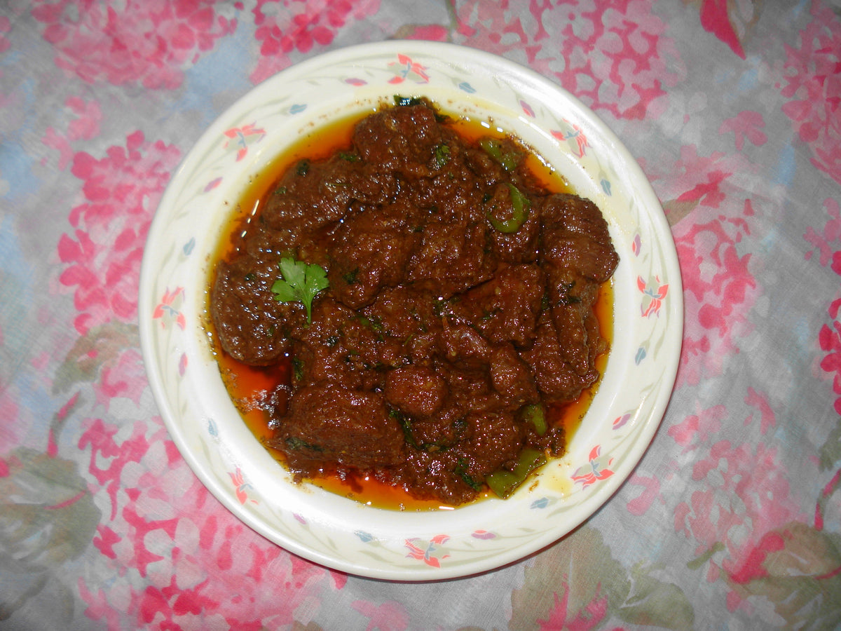 Vindaloo shown as a serving use for Spice Czar Vindaloo Curry Seasoning. Photo by Miansari66 via Wikimedia Commons, CC0.