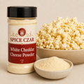 White Cheddar Cheese Powder 4 oz shaker with visible powder and popcorn serving suggestion